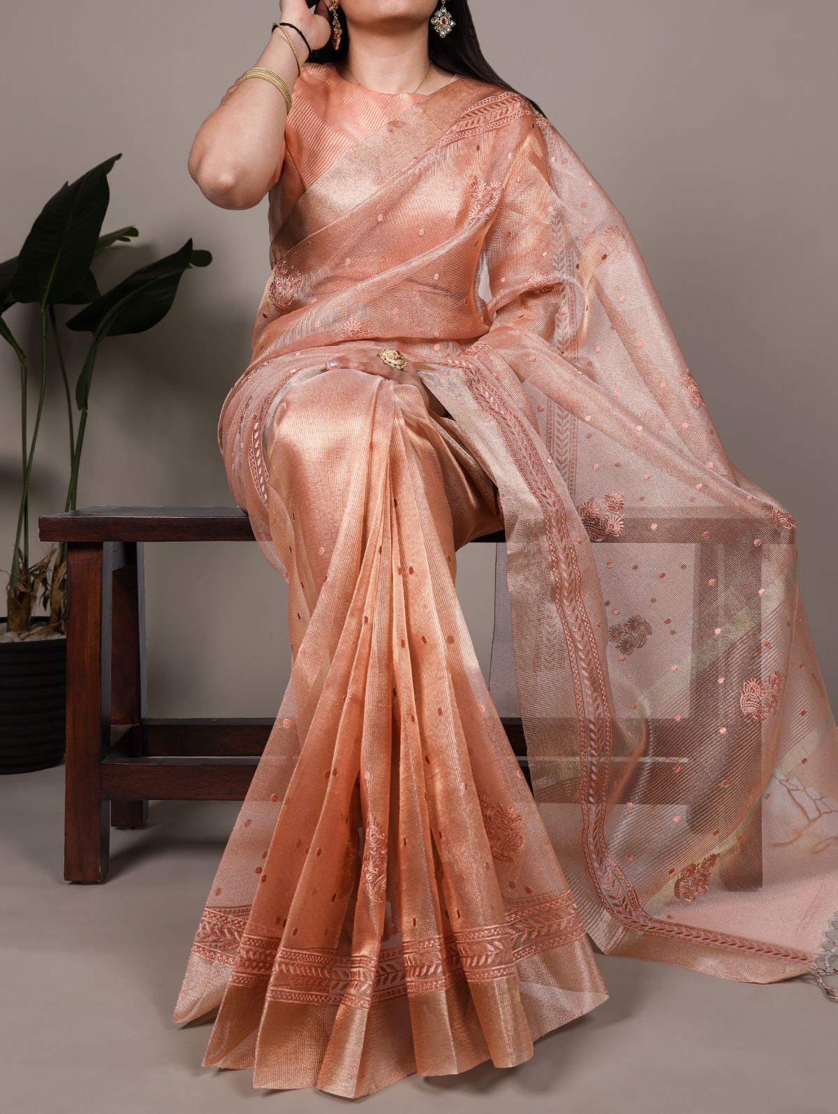 Orange poly shimmer thread embroidered saree with unstitched blouse