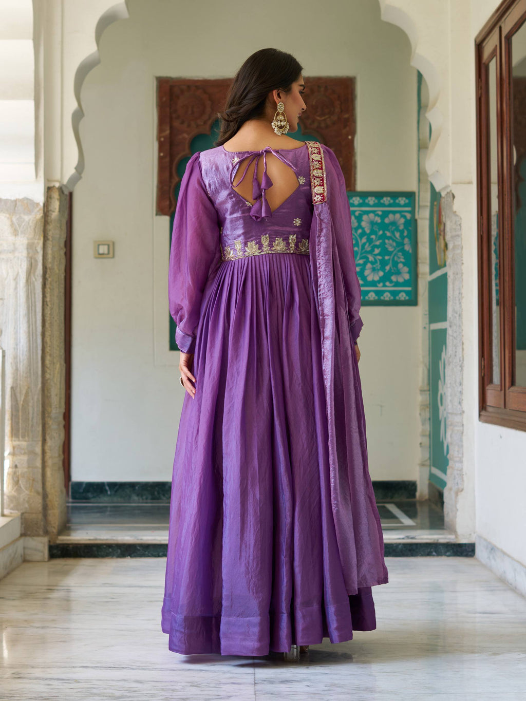 Ritu purple Fendy silk gown with sequins thread embroidery and dupatta