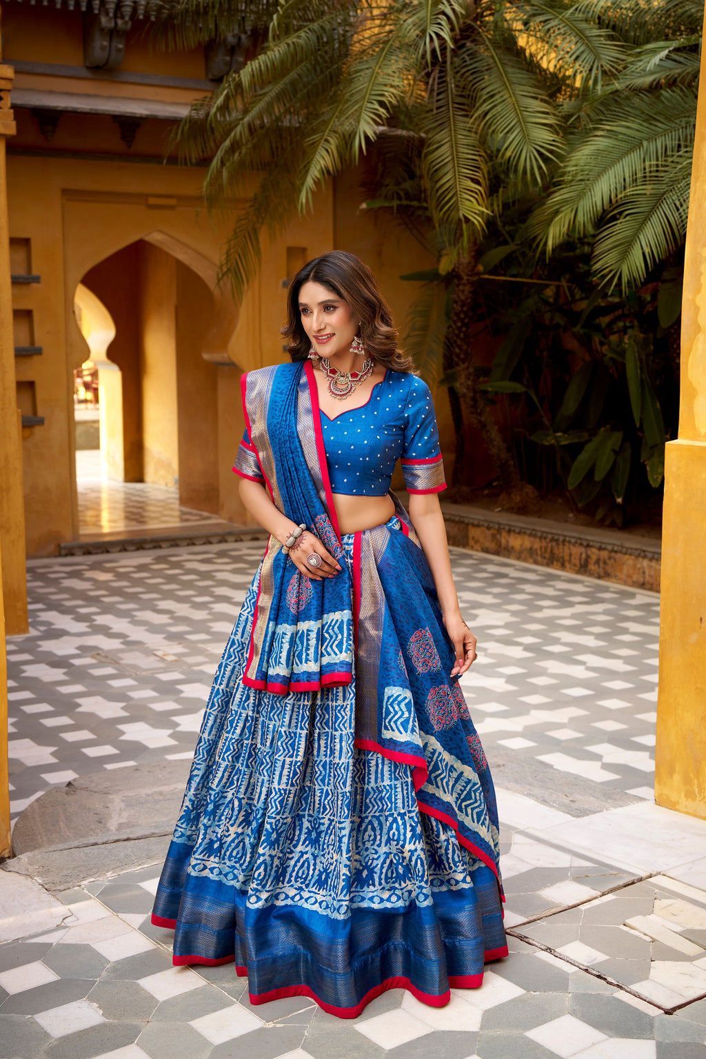 Girija blue Dola silk batik print lehenga choli with zari weaving work