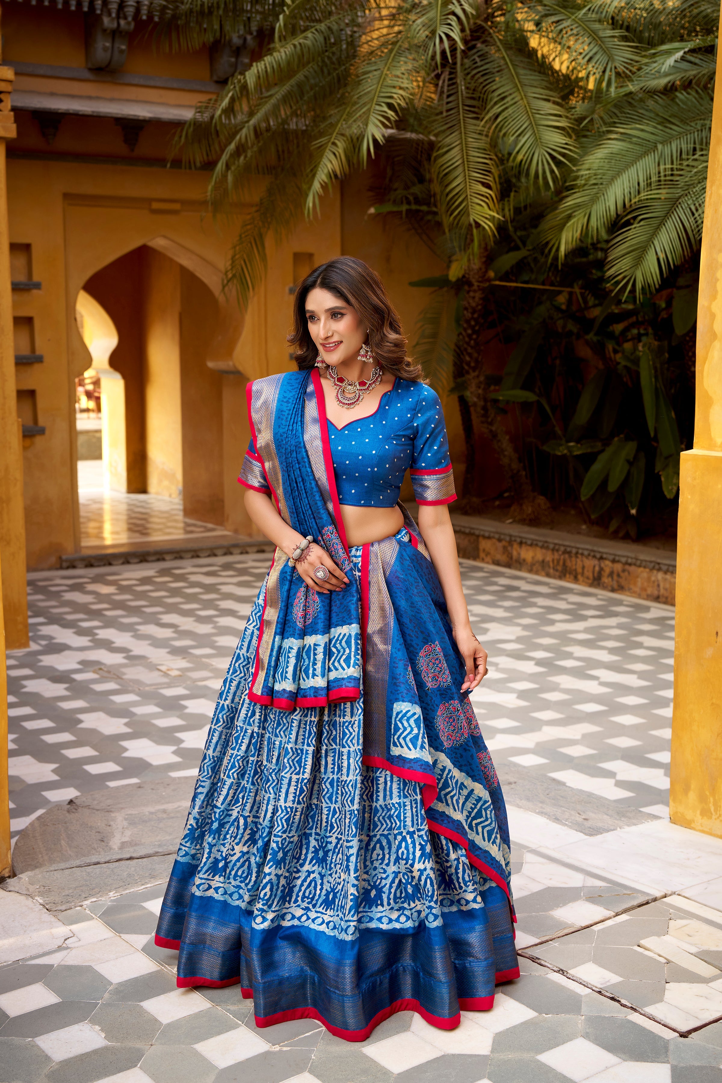 Girija blue Dola silk batik print lehenga choli with zari weaving work