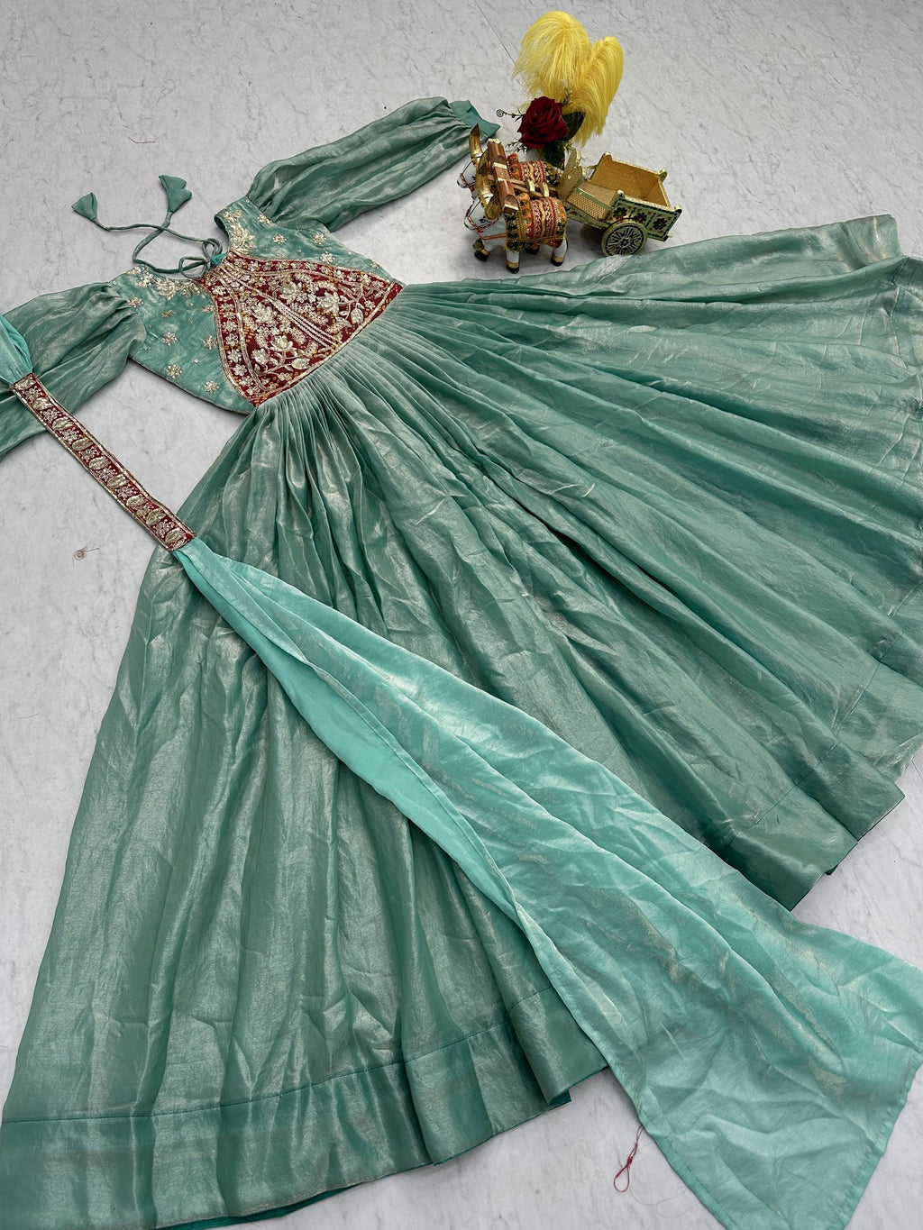 Ritu sea green Fendy silk gown with sequins thread embroidery and dupatta