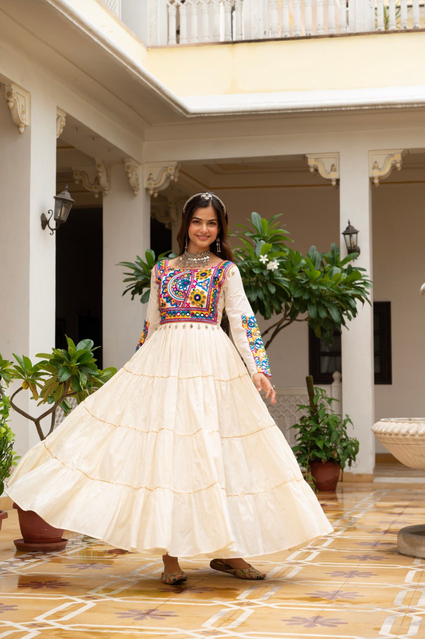Off-white cotton gown with Kutchi Gamthi mirror embroidery and lace