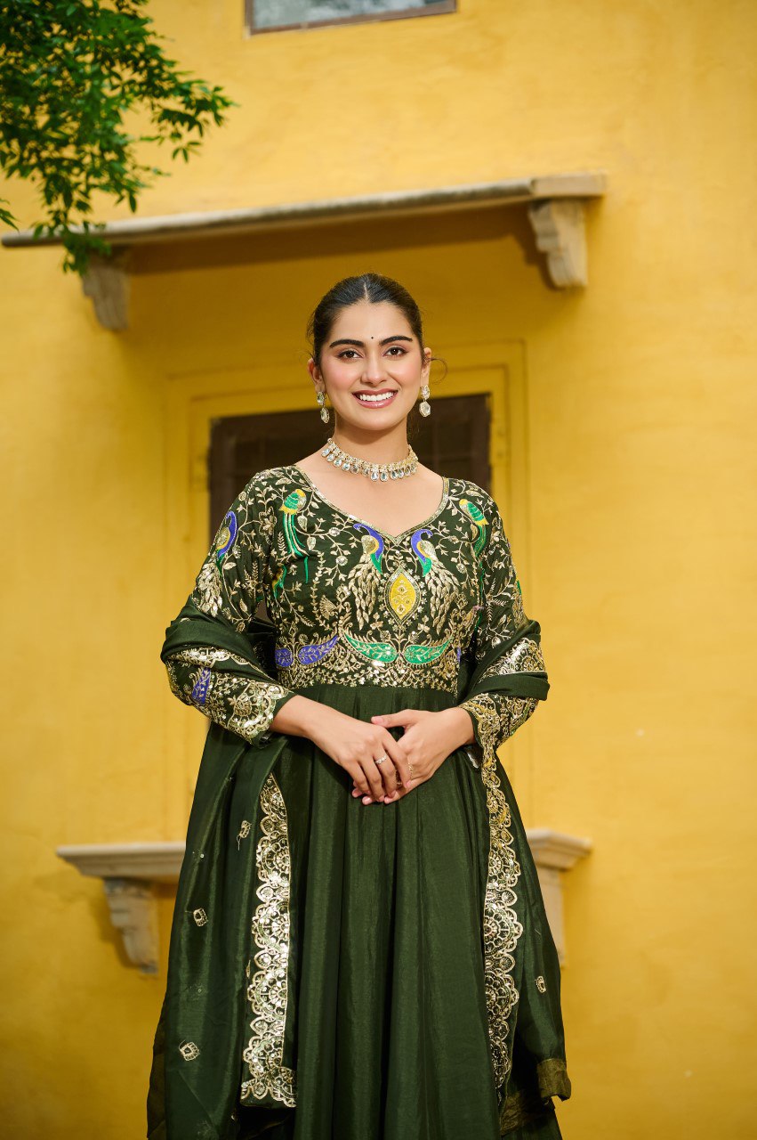 Maroon silk gown with multi thread zari embroidery and dupatta