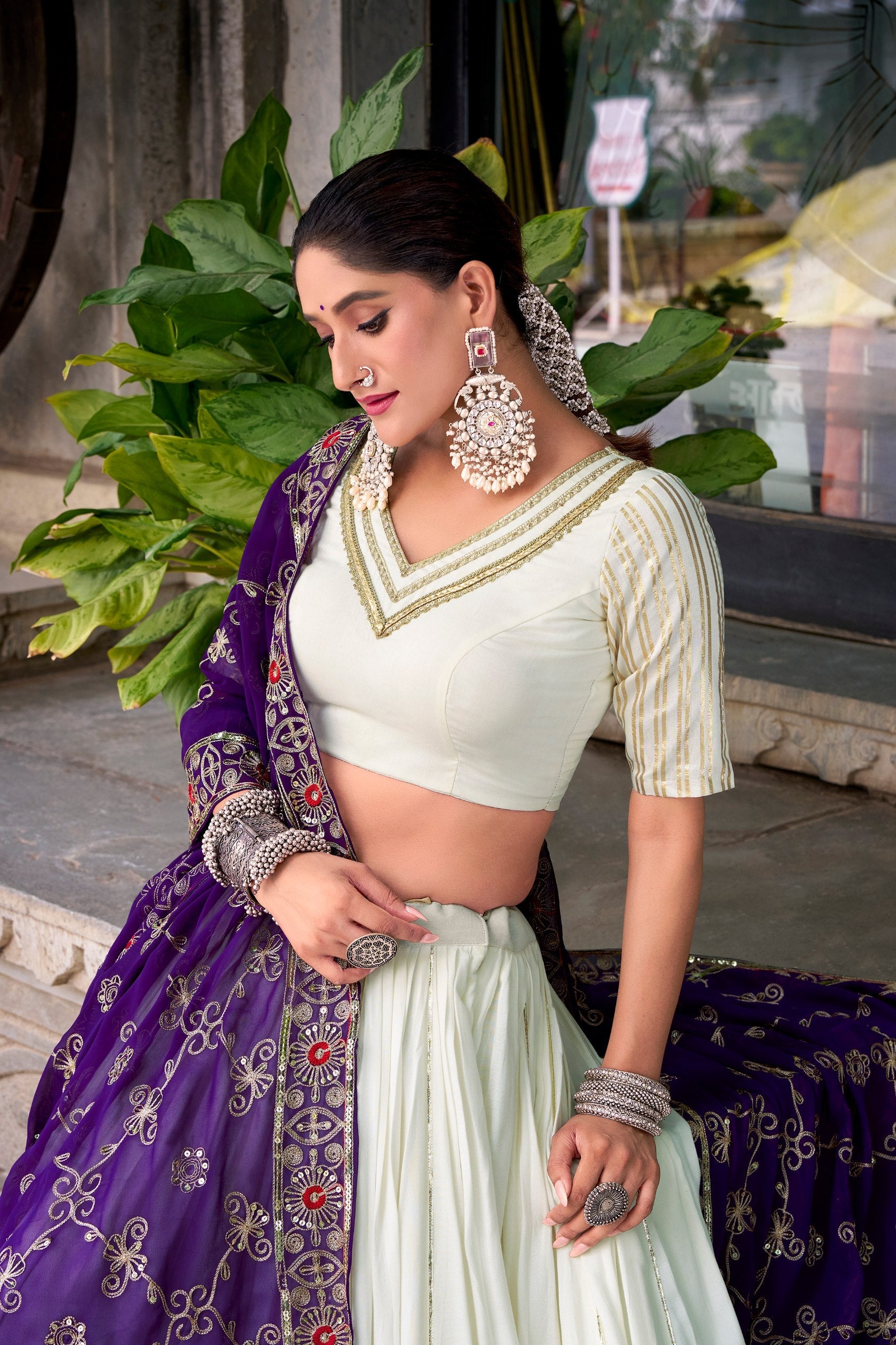 White pure rayon lace work lehenga choli with georgette sequins dupatta