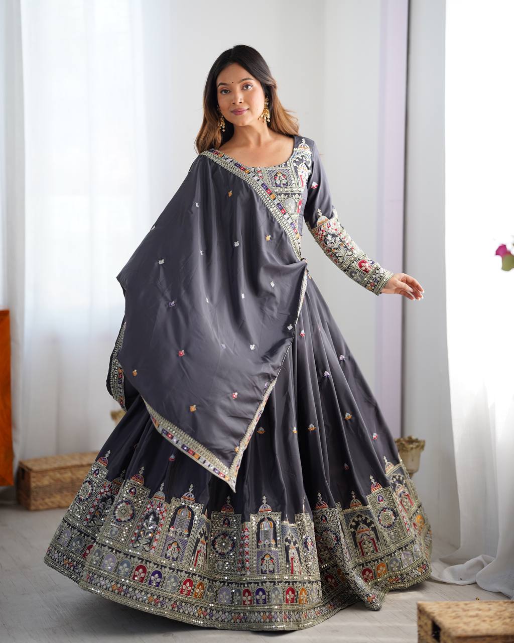 Kavyani Natural Crepe Silk Black Lehenga Choli Set – semi-stitched lehenga with 3-meter flair, cancan and canvas patta, intricately embroidered with coding dori, thread, and sequins; paired with unstitched matching choli and embroidered dupatta with lace border, premium festive and wedding ethnic wear for women by Trinaari.