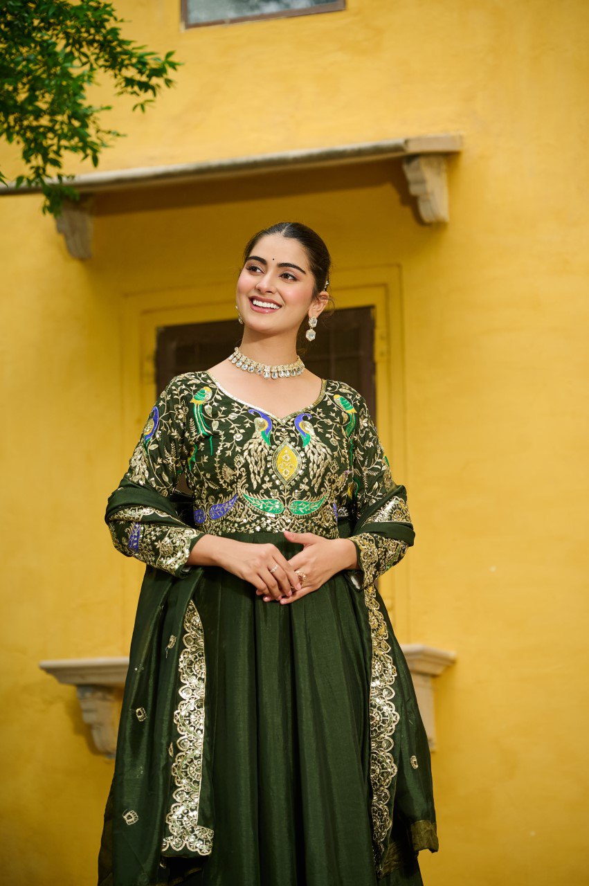 Maroon silk gown with multi thread zari embroidery and dupatta