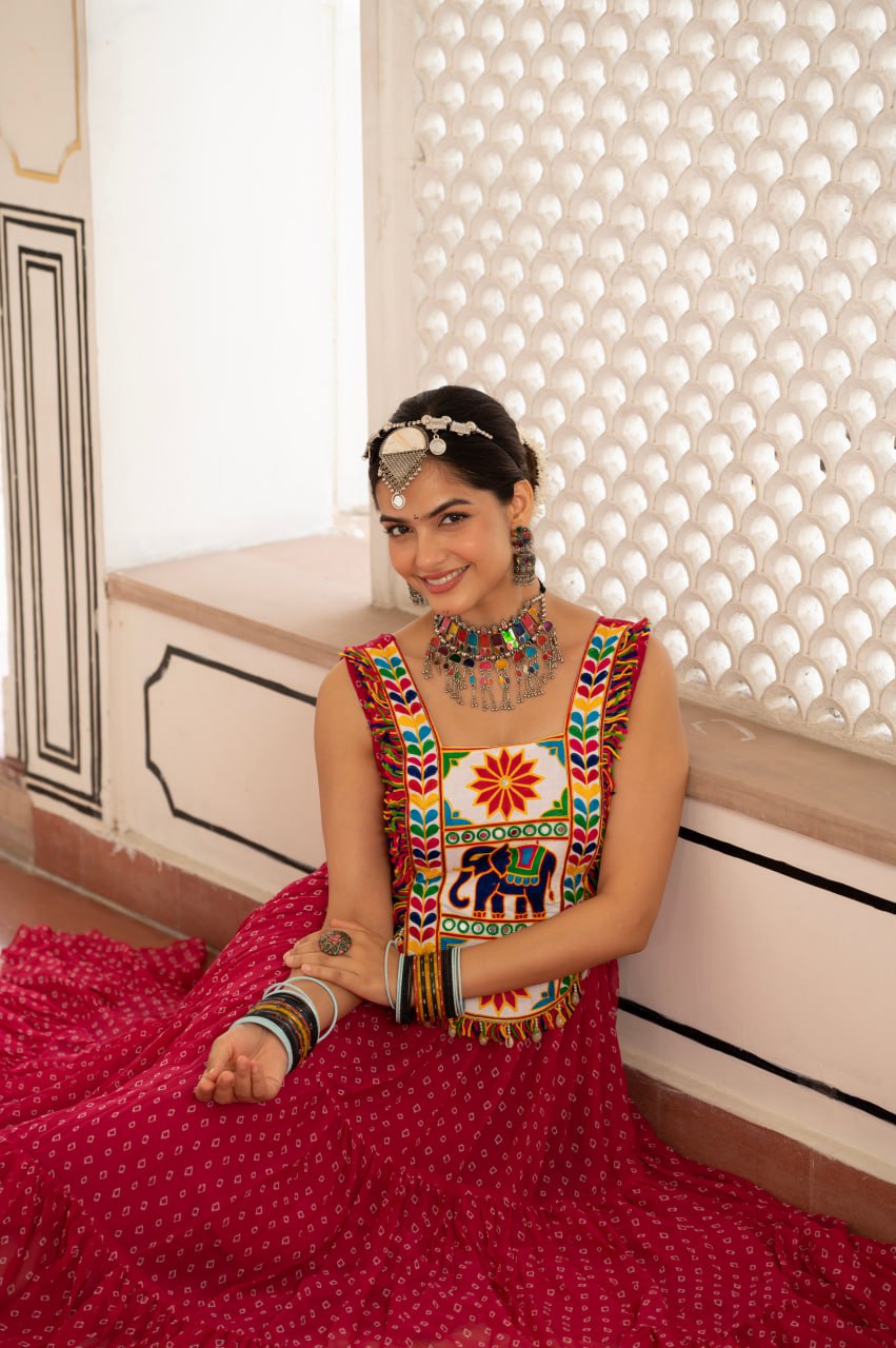 Pink faux georgette Bandhani print Kutchi patch mirror work gown