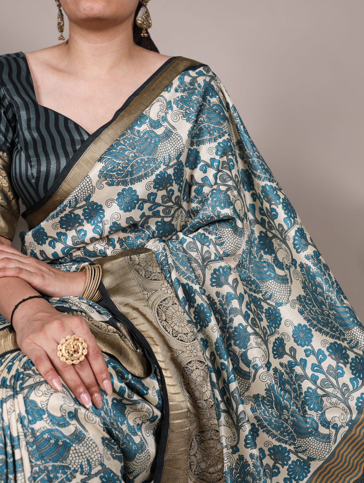 Teal blue tasar silk printed saree with viscose border and blouse
