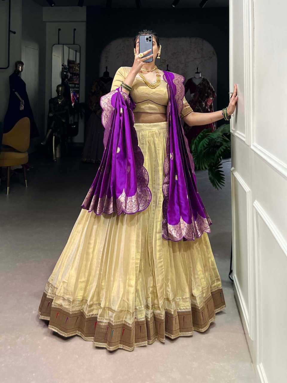 Cream silk lehenga choli with Paithani lace border and jacquard zari dupatta