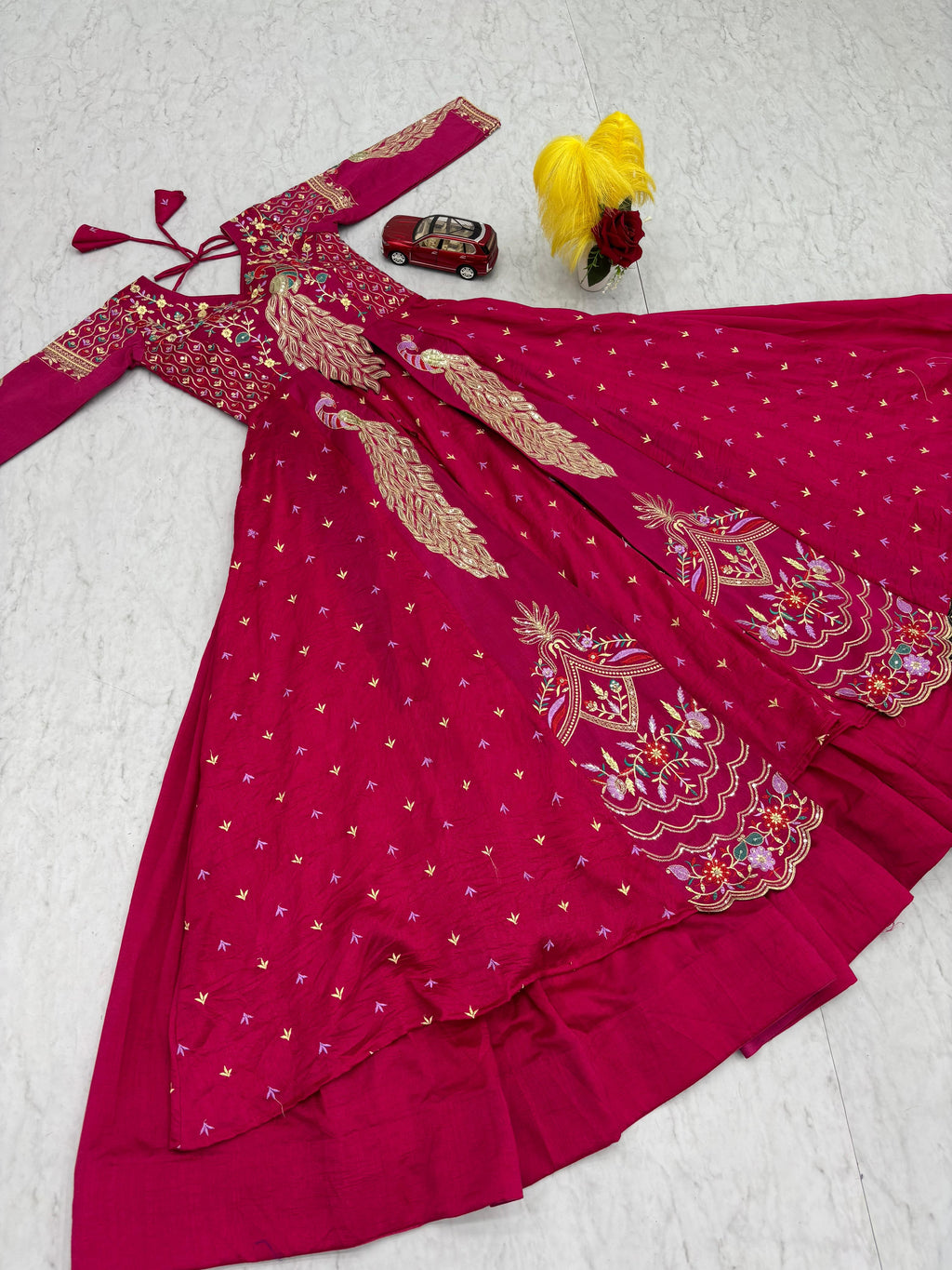 Mani pink vichitra silk crop top peacock design lehenga with embroidered shrug
