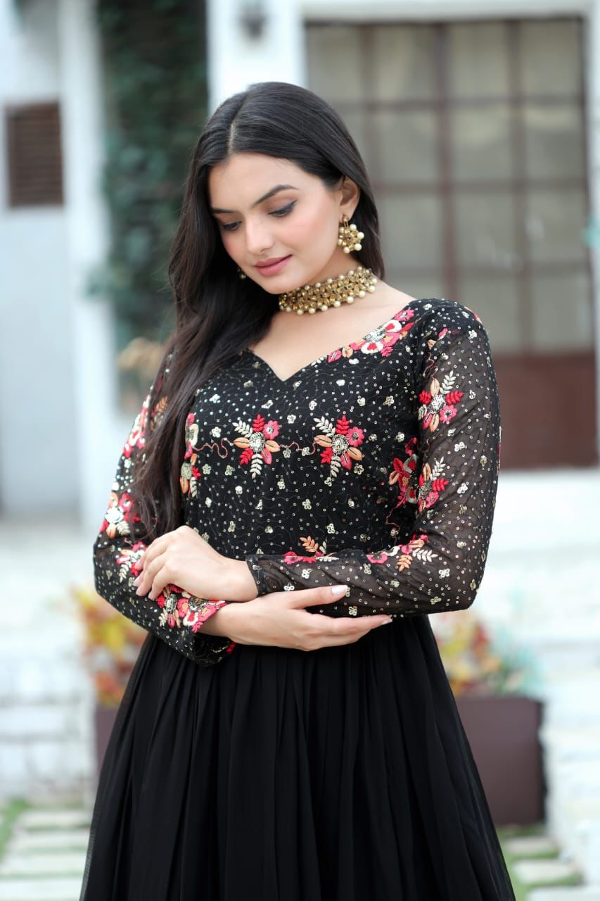 Radiant charisma embroidered sequin adorned double frill gown
