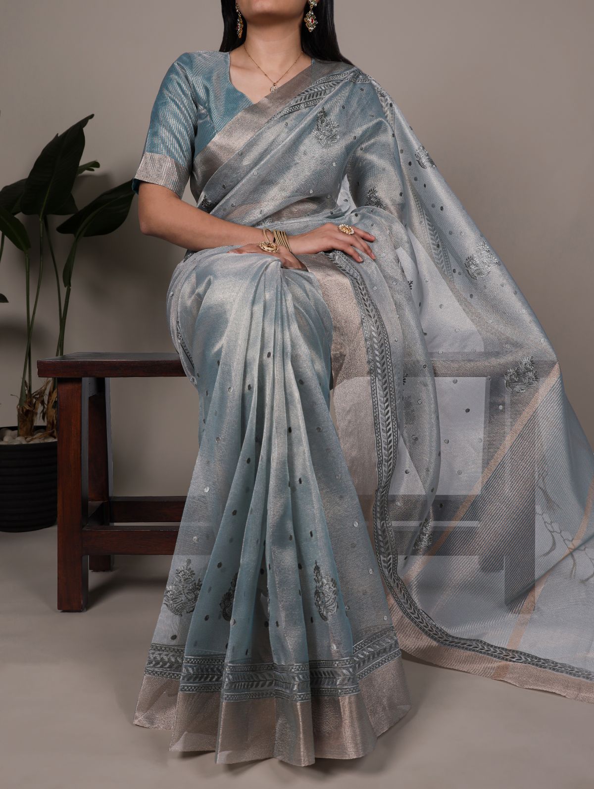 Sky blue poly shimmer thread embroidered saree with unstitched blouse