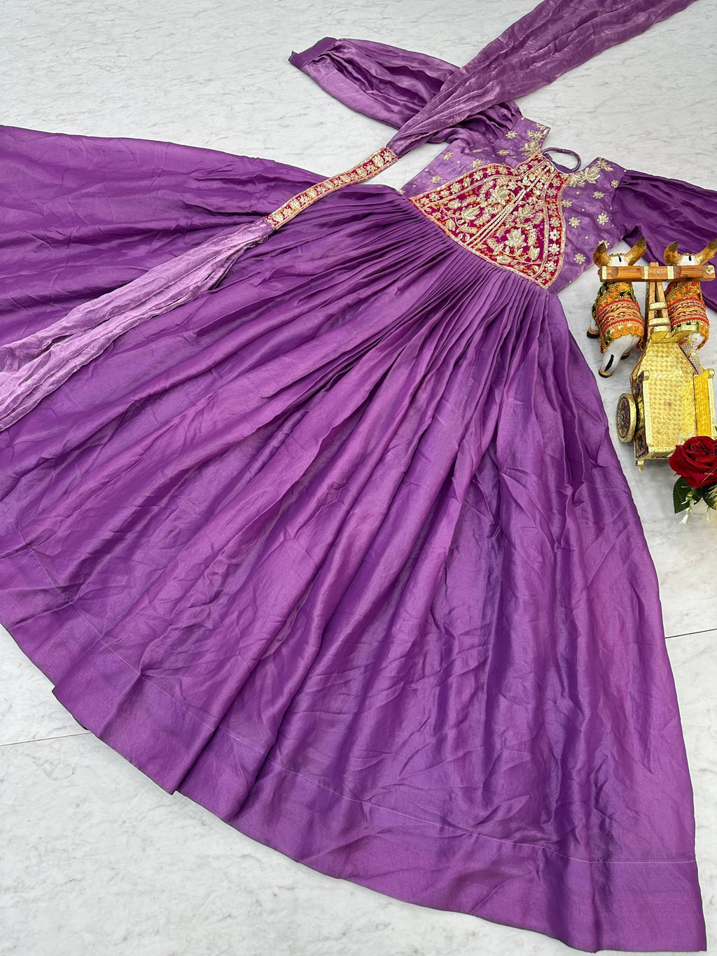 Ritu purple Fendy silk gown with sequins thread embroidery and dupatta