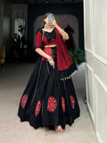 Black pure cotton Gamthi patch work lehenga choli with mirror work dupatta and purse