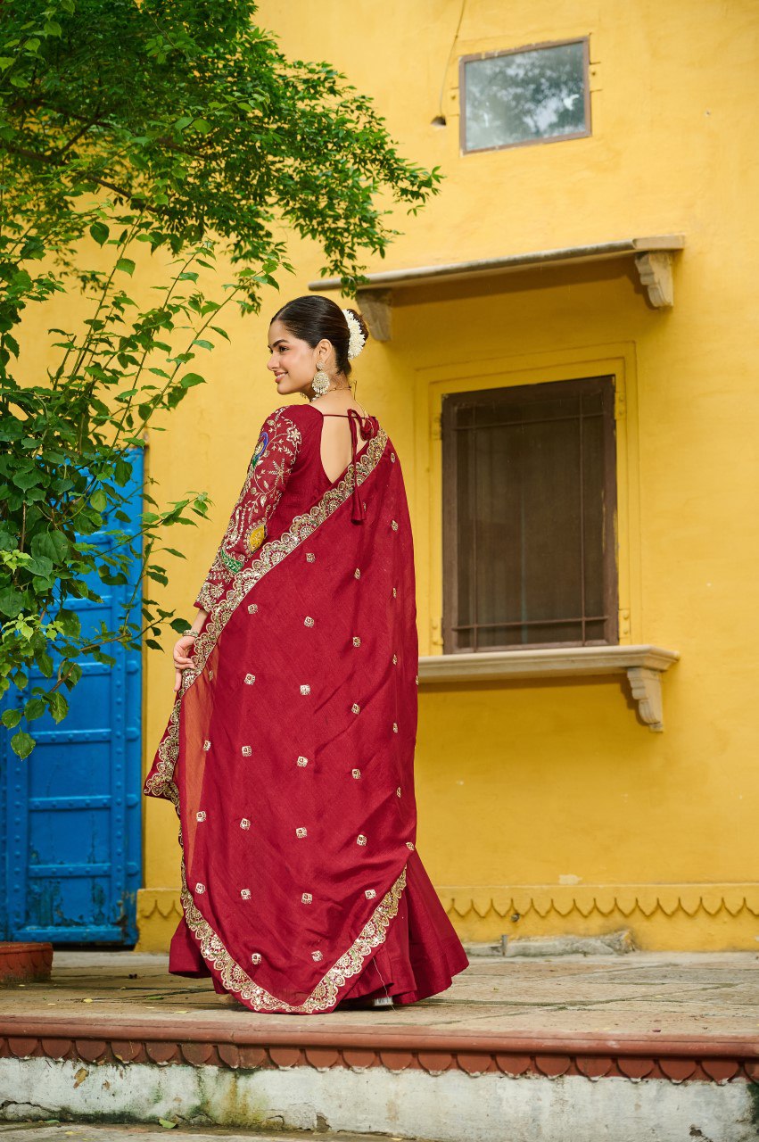Maroon silk gown with multi thread zari embroidery and dupatta