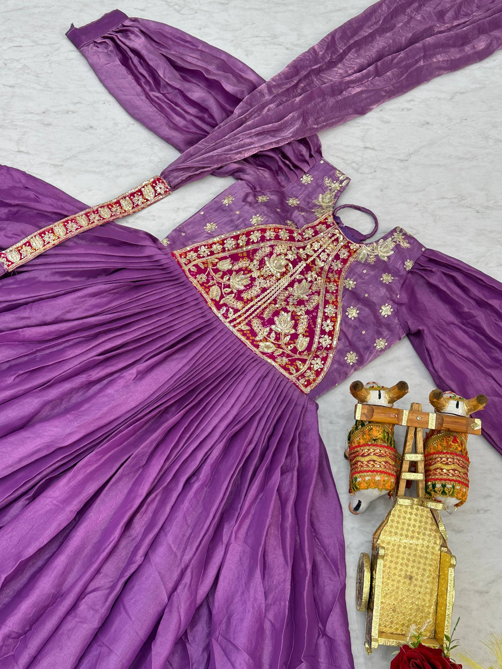 Ritu purple Fendy silk gown with sequins thread embroidery and dupatta