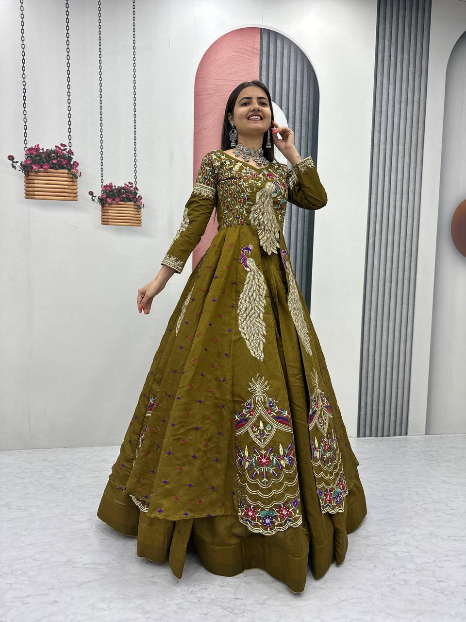 Mani olive green Vichitra silk crop top peacock design lehenga with embroidered shrug