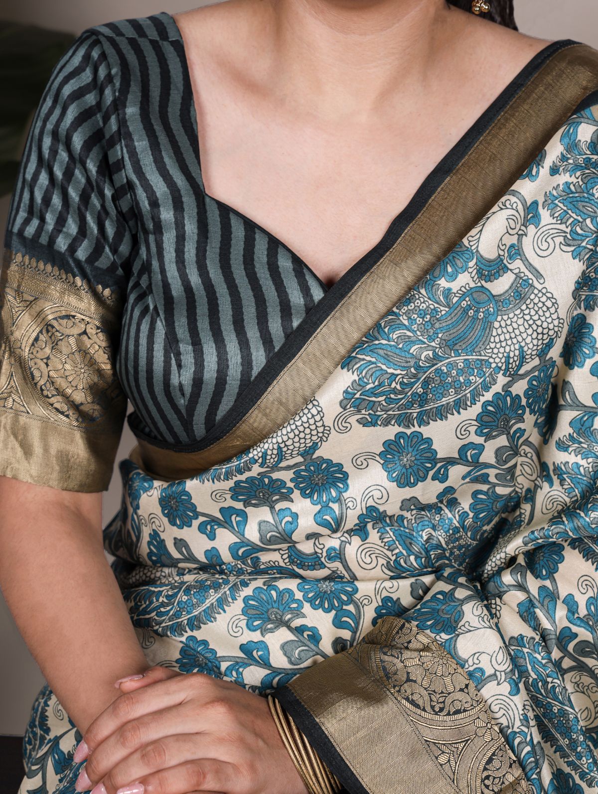 Teal blue tasar silk printed saree with viscose border and blouse