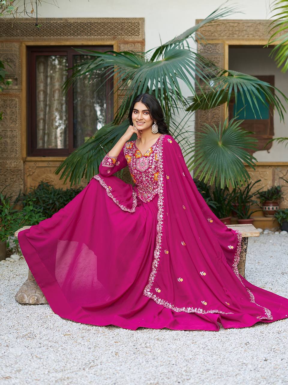 Pink heavy sequins thread embroidered georgette gown for wedding functions