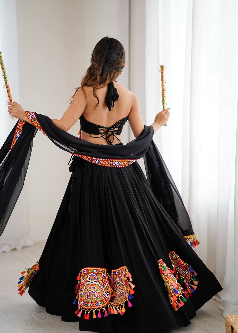 Black georgette lehenga choli with Gamthi embroidery and mirror work