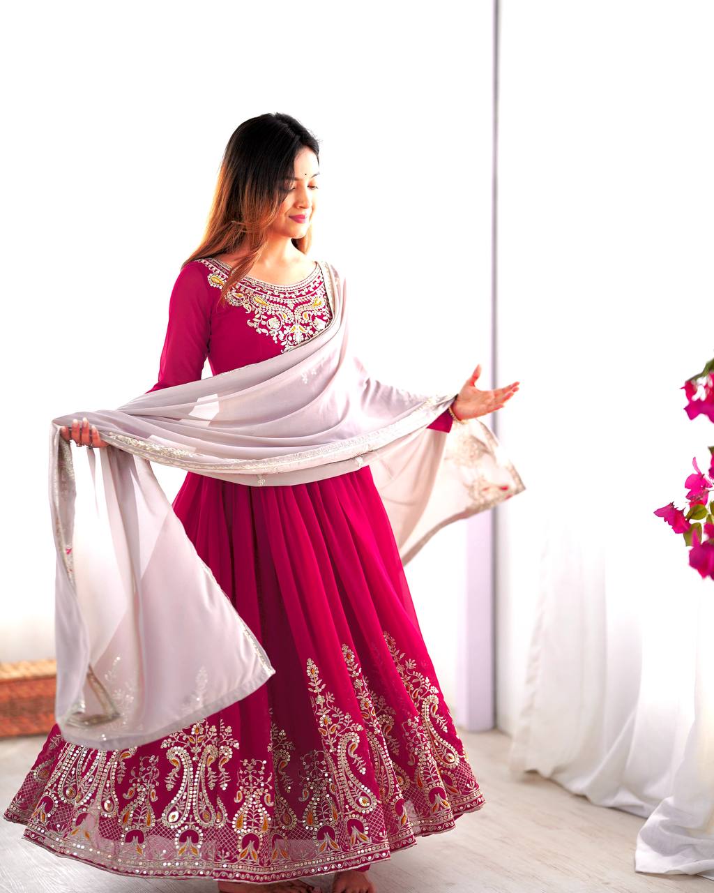 Pink georgette embroidered Tejvini designer gown