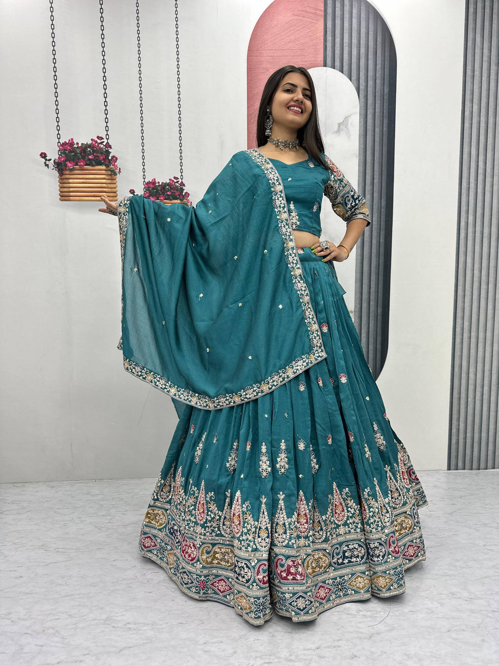 Raji teal green Vichitra silk lehenga choli with sequins thread embroidery and dupatta