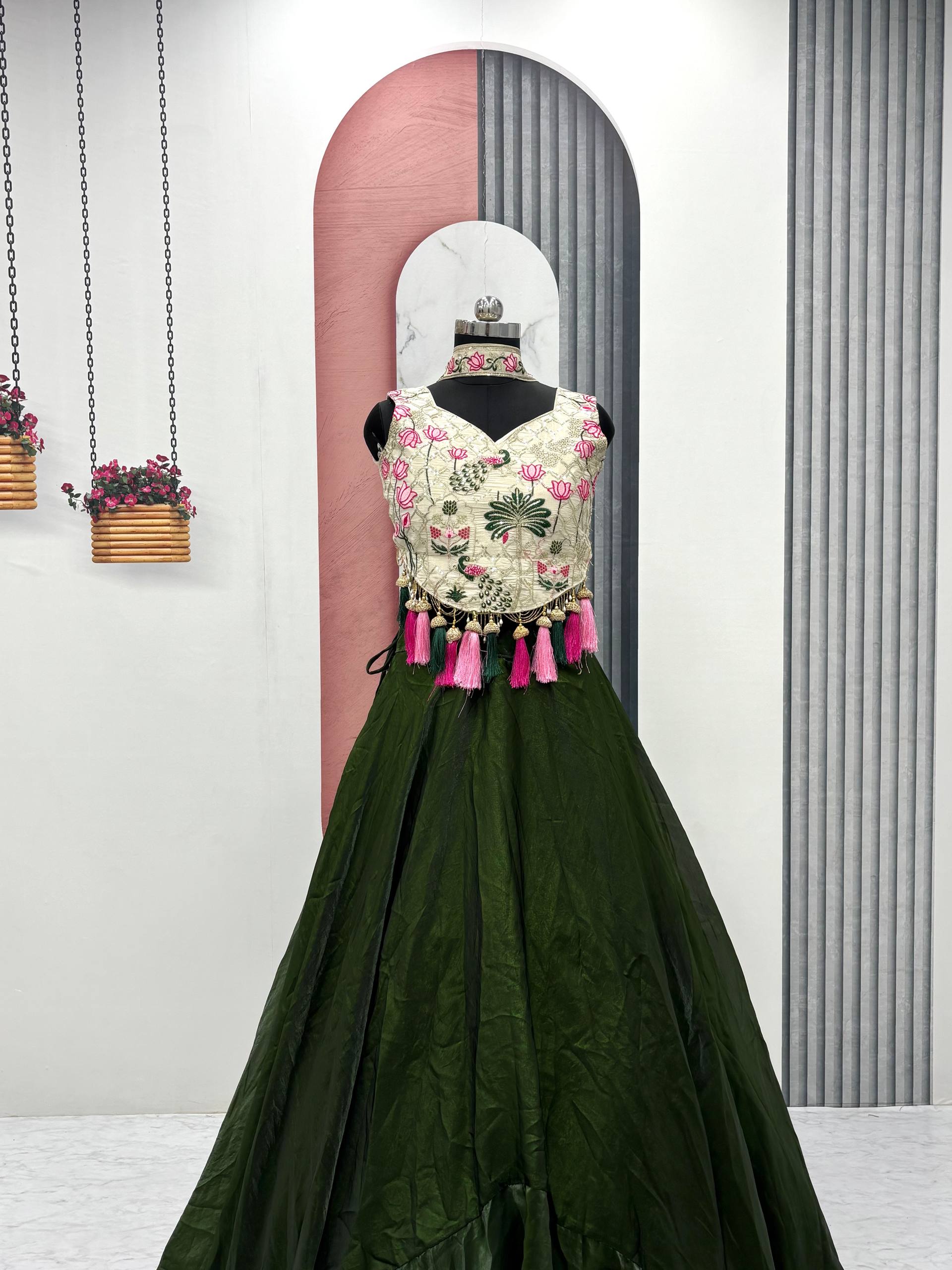Tanu green tissue silk lehenga choli with sequins thread work and dupatta