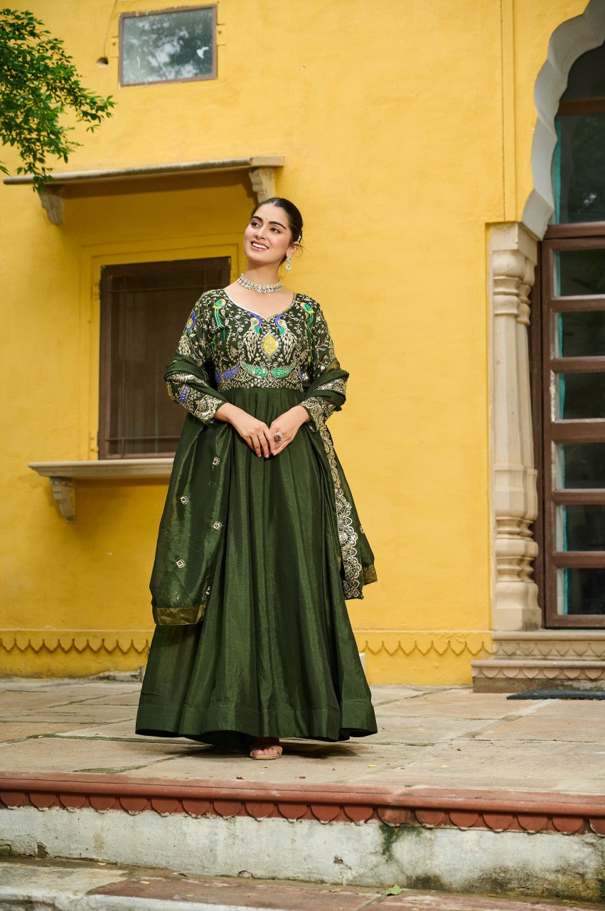 Maroon silk gown with multi thread zari embroidery and dupatta