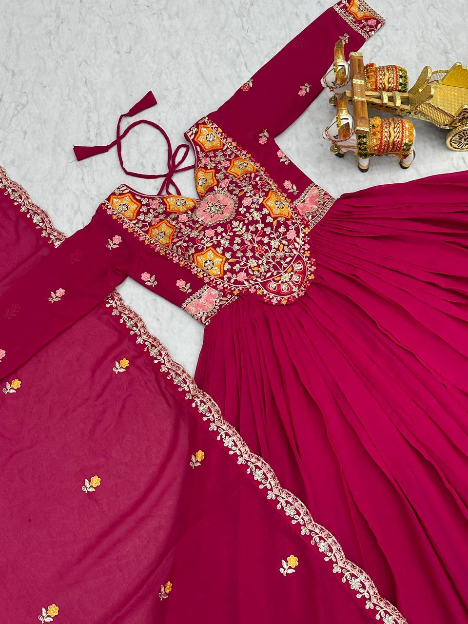 Pink heavy sequins thread embroidered georgette gown for wedding functions