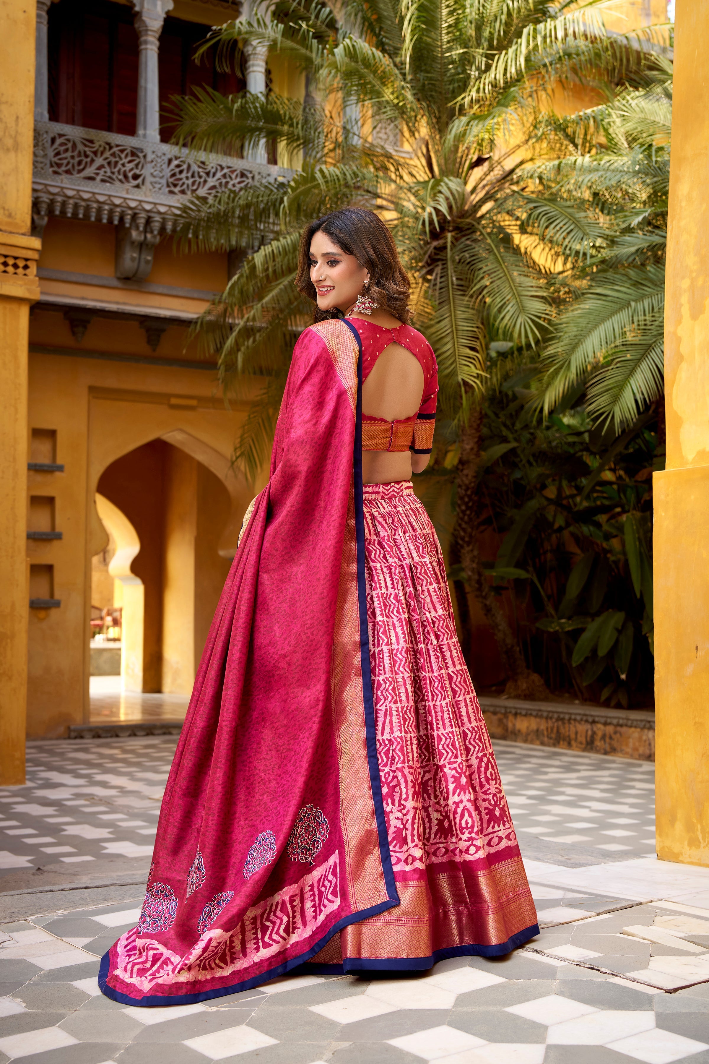 Girija pink Dola silk batik print lehenga choli with zari weaving work