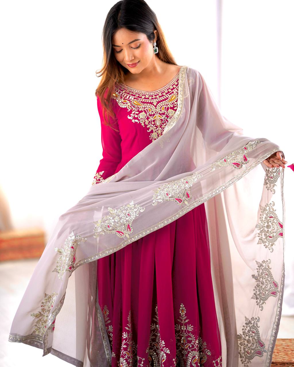 Pink georgette embroidered Tejvini designer gown