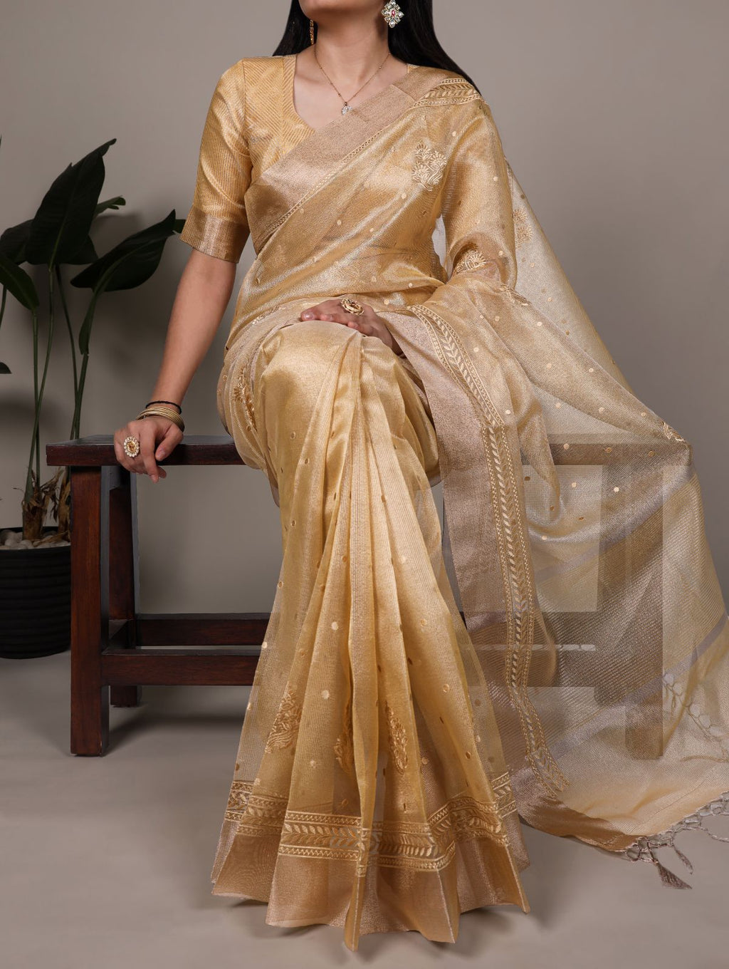 Yellow poly shimmer thread embroidered saree with unstitched blouse