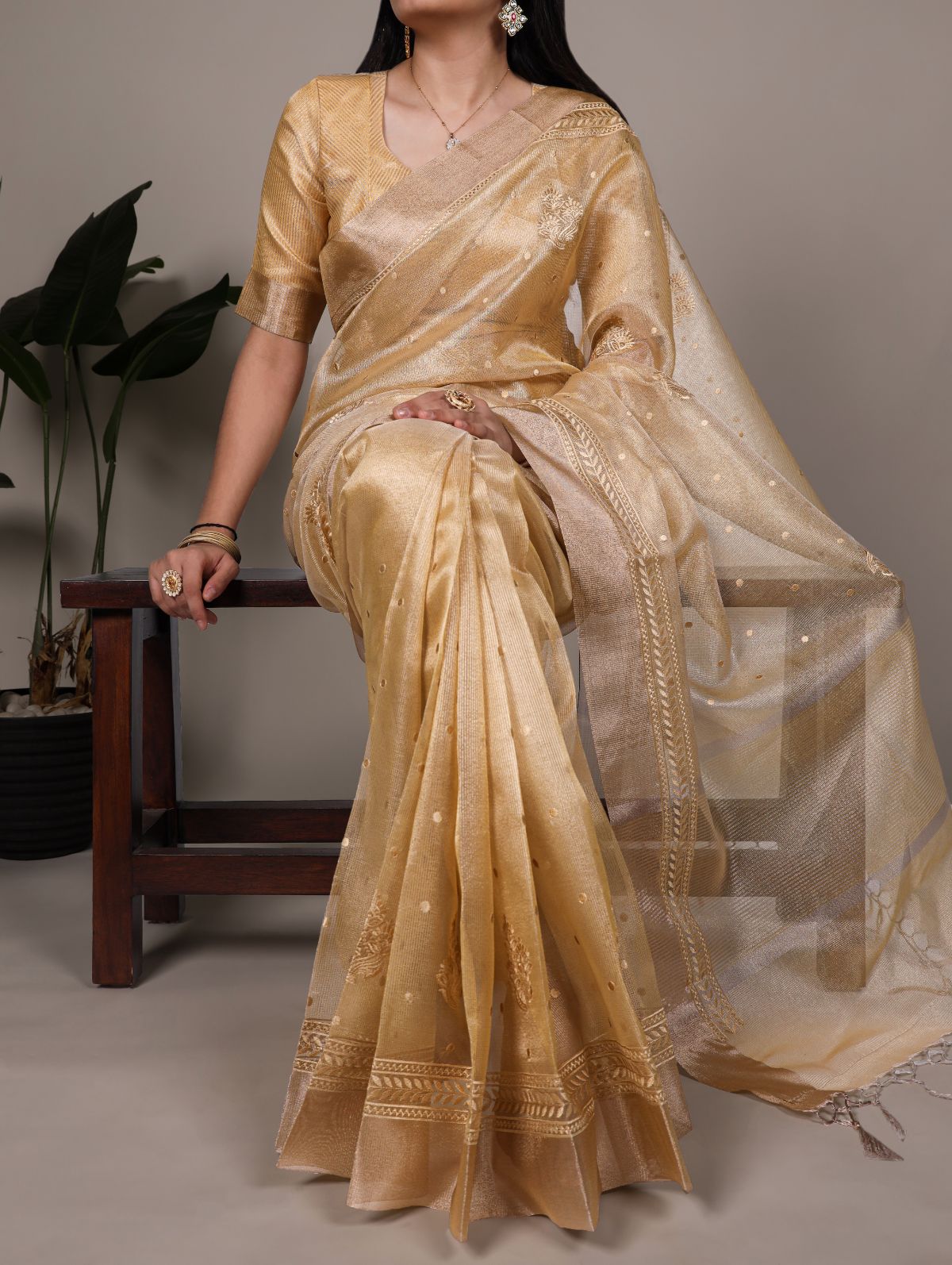 Yellow poly shimmer thread embroidered saree with unstitched blouse