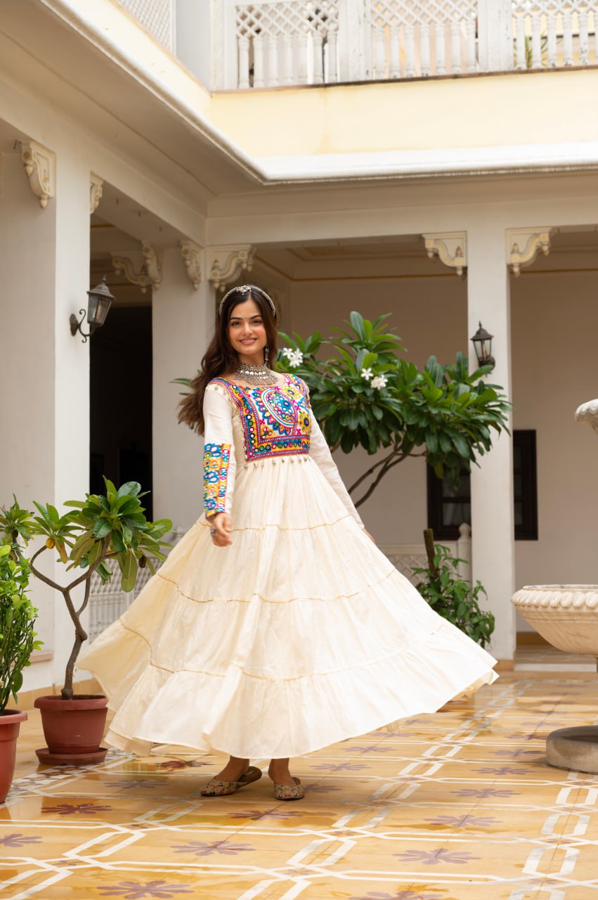Off-white cotton gown with Kutchi Gamthi mirror embroidery and lace