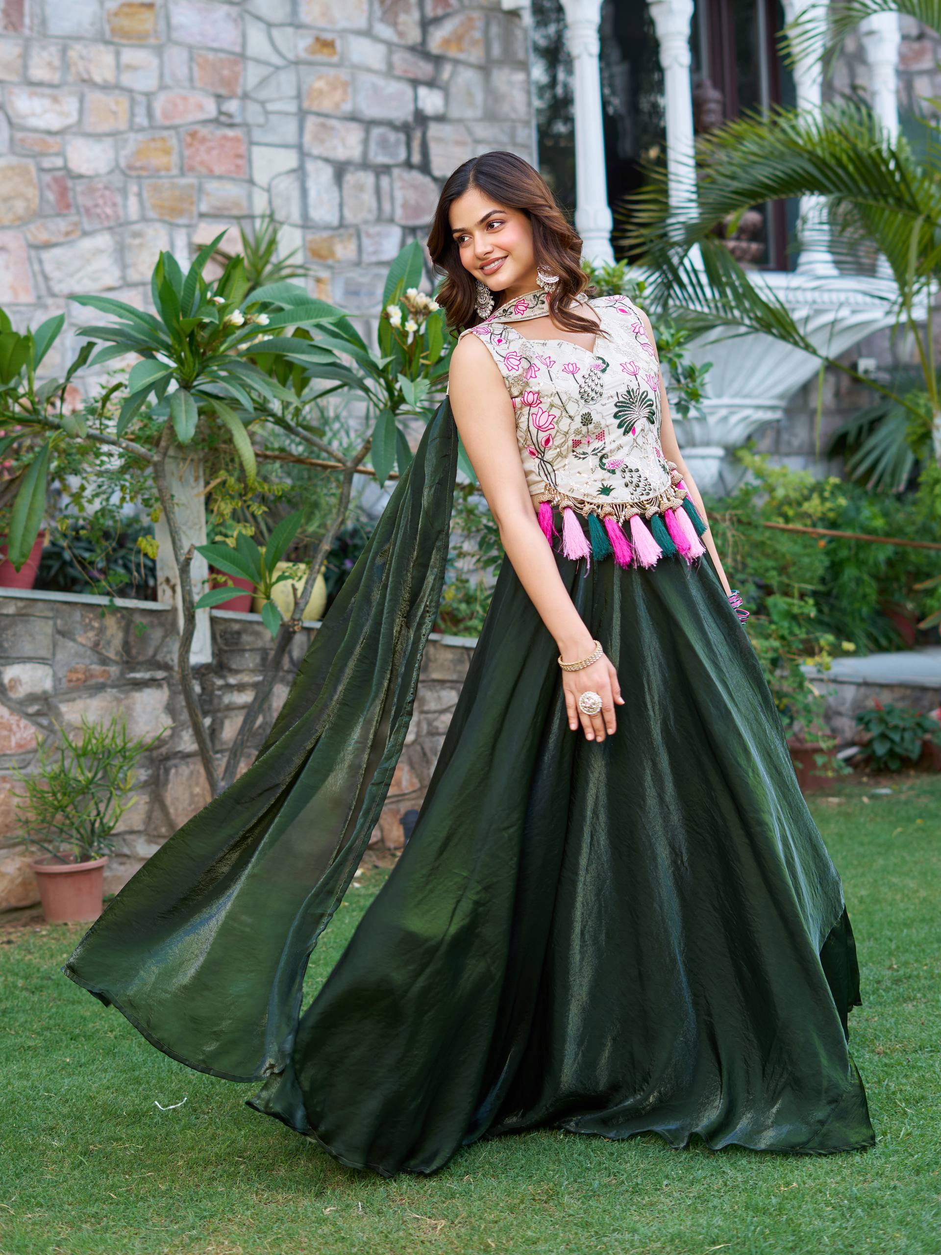 Tanu green tissue silk lehenga choli with sequins thread work and dupatta