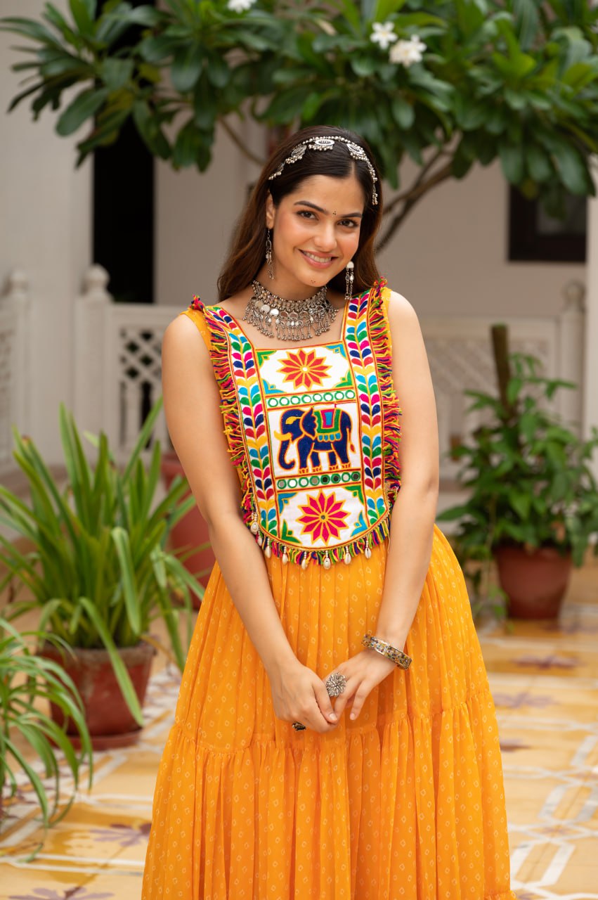 Yellow faux georgette Bandhani print Kutchi patch mirror work gown