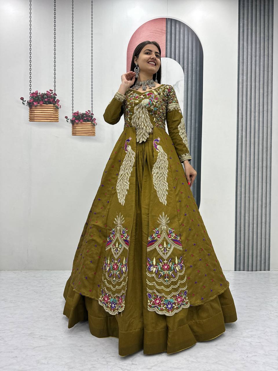Mani olive green Vichitra silk crop top peacock design lehenga with embroidered shrug