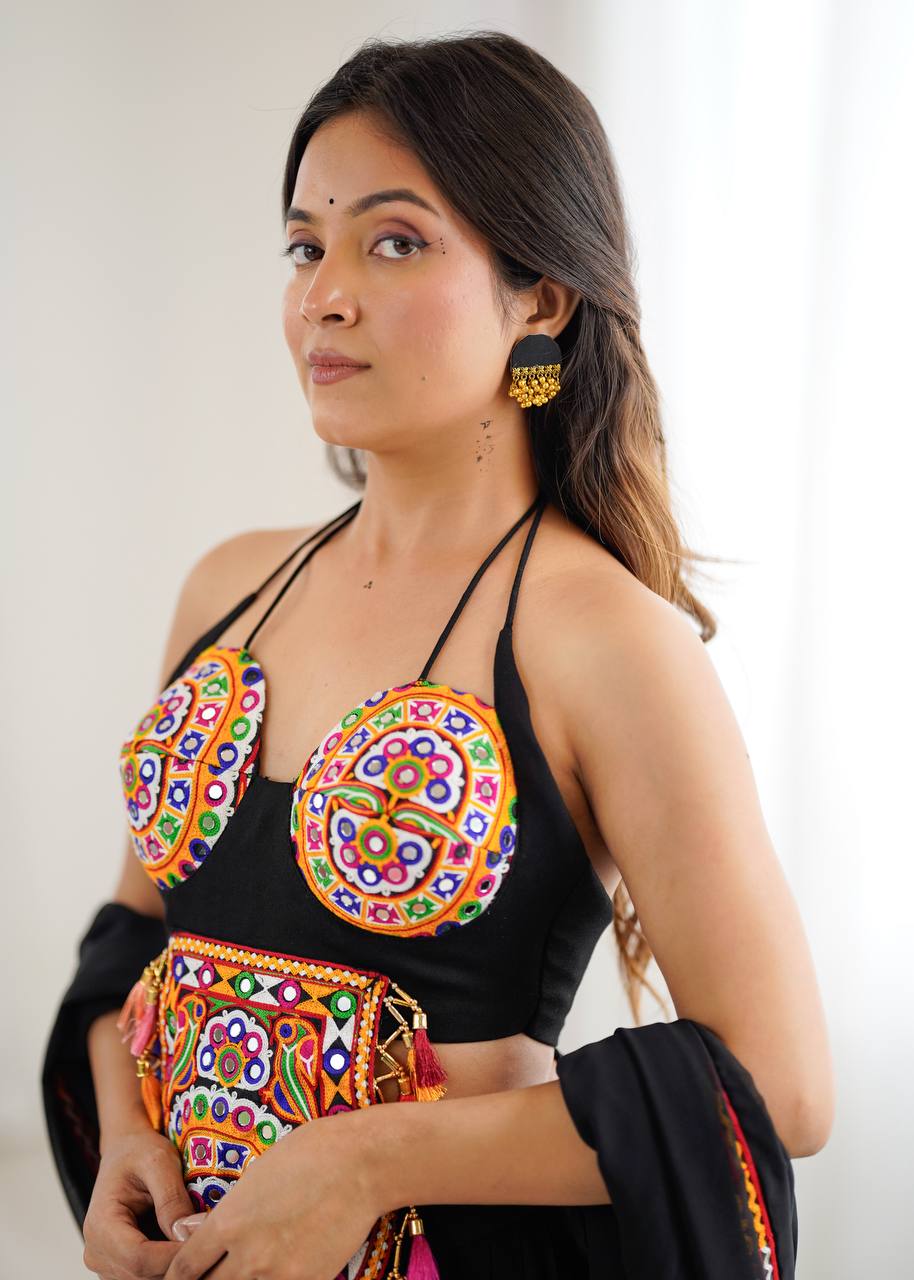 Black georgette lehenga choli with Gamthi embroidery and mirror work