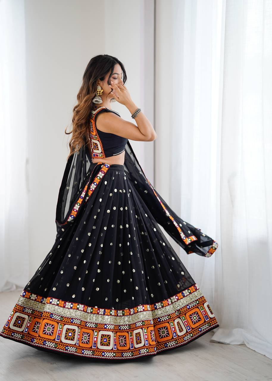 Black georgette lehenga choli with Gamthi embroidery and mirror work