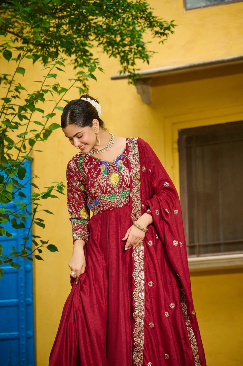 Maroon silk gown with multi thread zari embroidery and dupatta