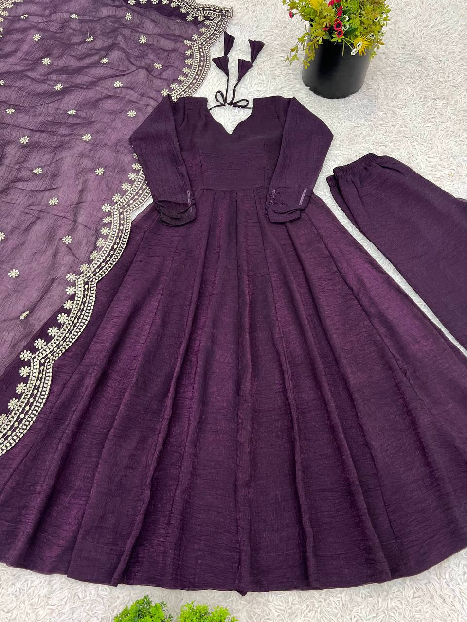 Tiya purple Fandy Silk Anarkali suit with 4.5-meter flair, full sleeves & embroidered dupatta – stitched & ready for weddings, parties & festive wear.