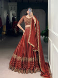 Rust orange silk lehenga choli with sequins thread embroidery