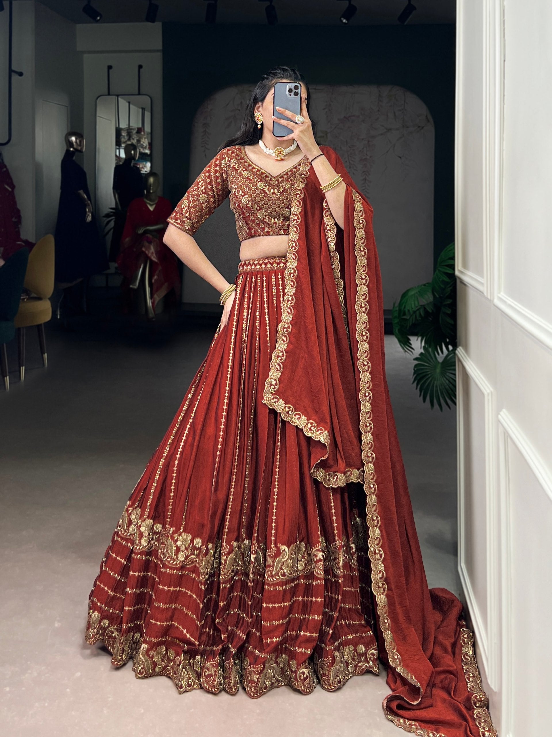 Rust orange silk lehenga choli with sequins thread embroidery