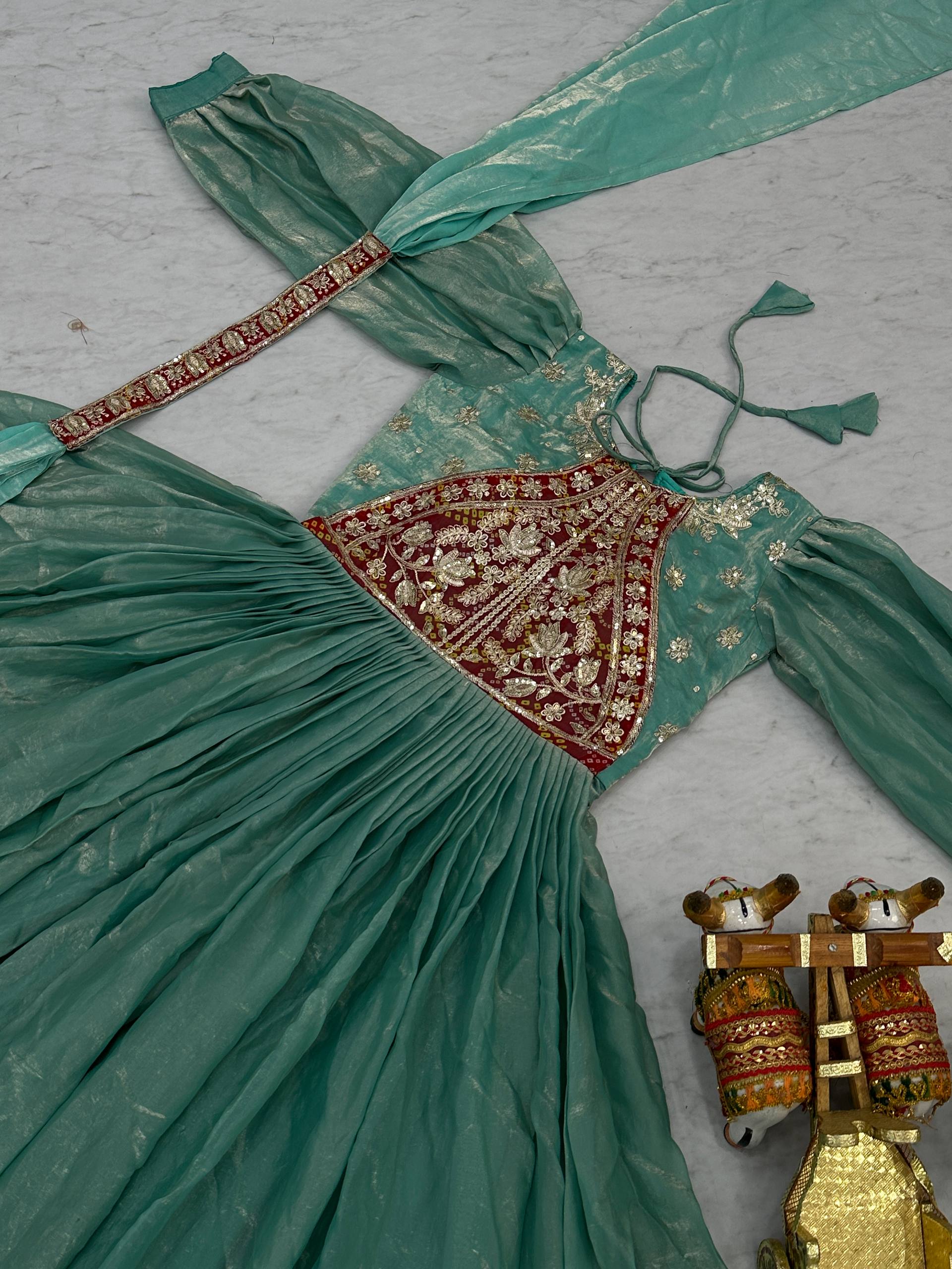Ritu sea green Fendy silk gown with sequins thread embroidery and dupatta