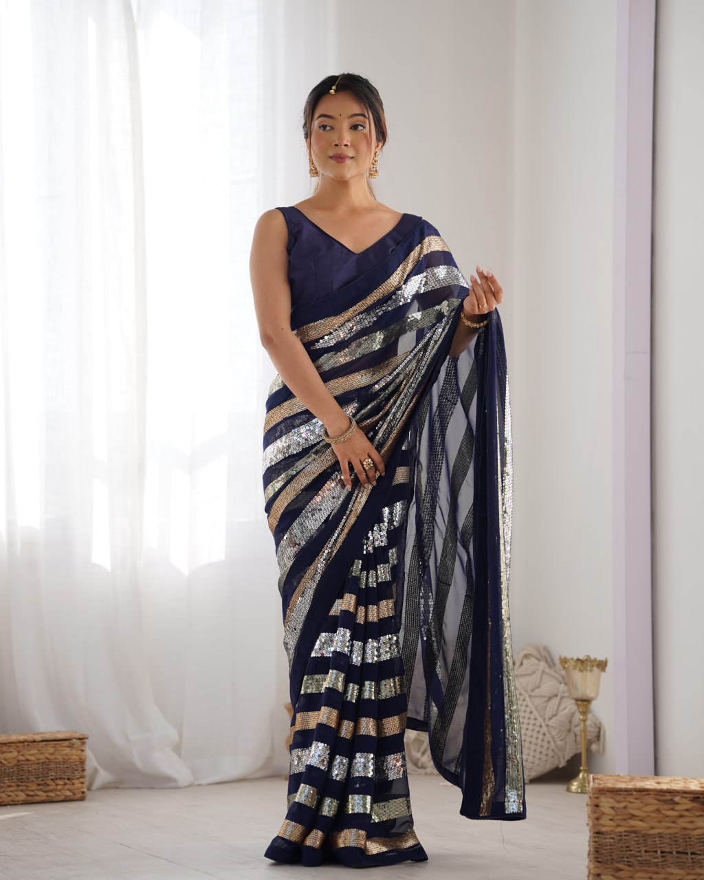 Deep blue georgette sequin embroidered Kira designer saree