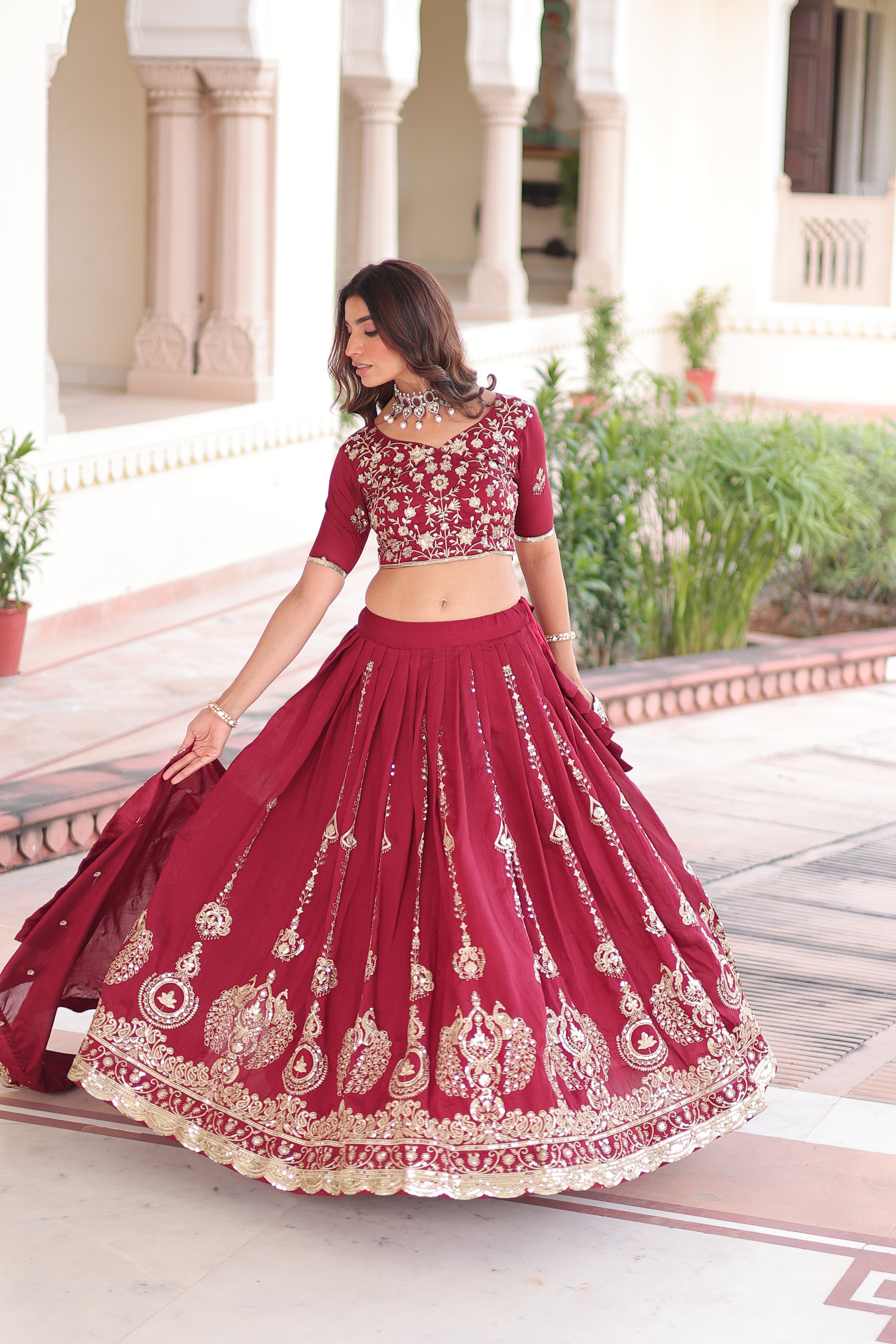Rumi maroon Vichitra silk lehenga choli with heavy sequins thread embroidery
