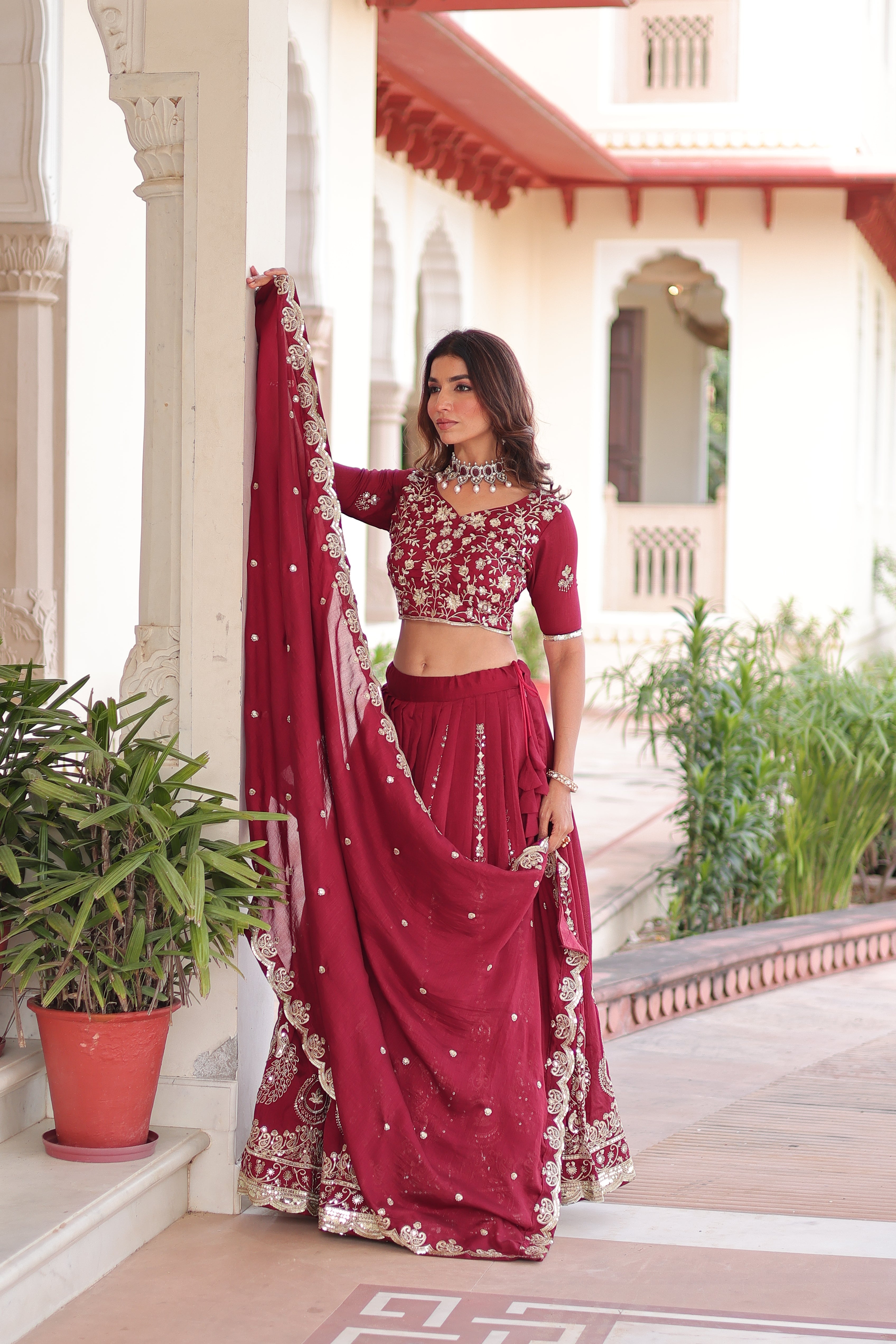 Rumi maroon Vichitra silk lehenga choli with heavy sequins thread embroidery