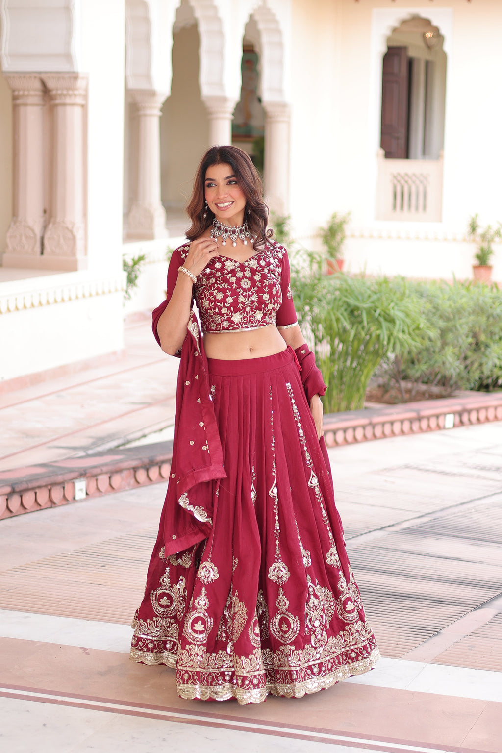 Rumi maroon Vichitra silk lehenga choli with heavy sequins thread embroidery