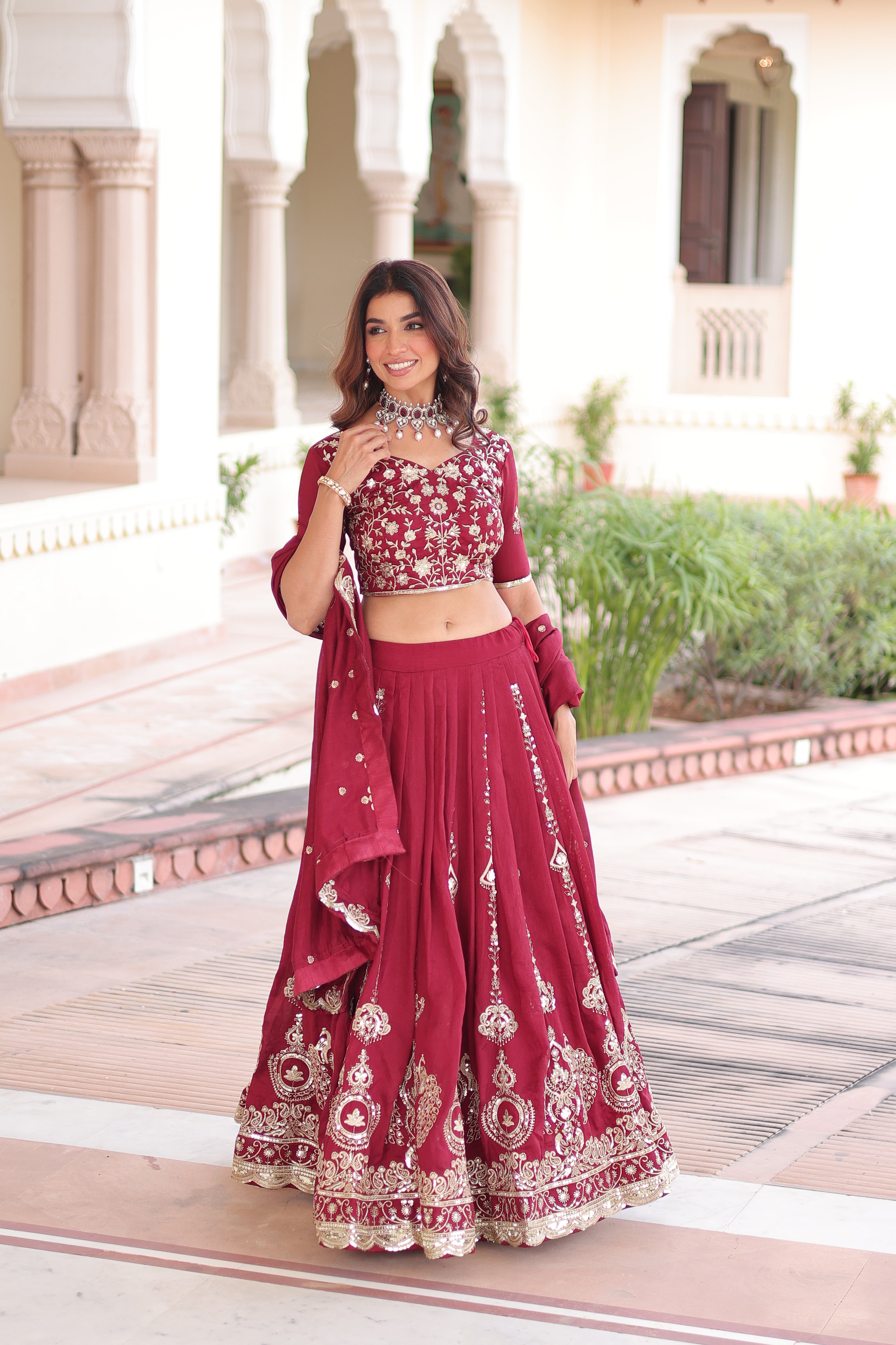 Rumi maroon Vichitra silk lehenga choli with heavy sequins thread embroidery