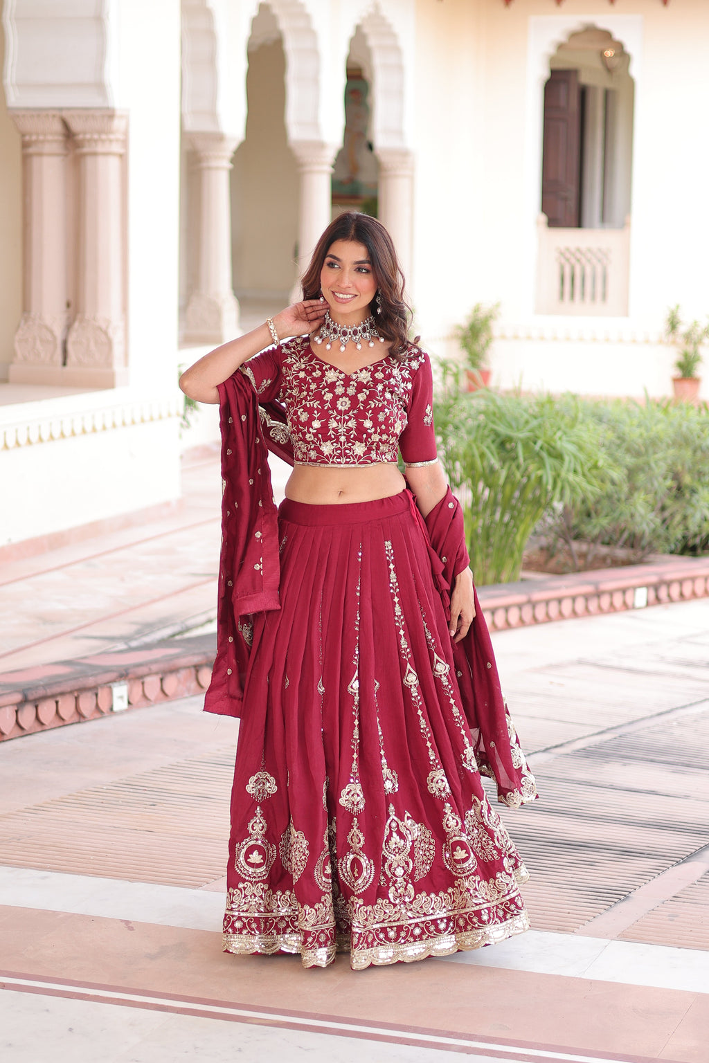 Rumi maroon Vichitra silk lehenga choli with heavy sequins thread embroidery